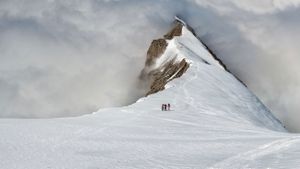Mountaineers on the Balmhorn in the Bernese Alps of Switzerland (© Alun Richardson/plainpicture)(Bing New Zealand)