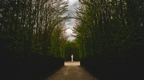 A statue in the Gardens of Versailles in France