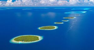Aerial view of Southern Maalhosmadulu Atoll, Maldives (© Sakis Papadopoulos/Getty Images) &copy; (Bing United States)