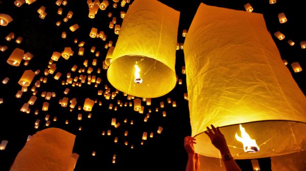 Fire lanterns released during Loi Krathong in Chiang Mai, Thailand