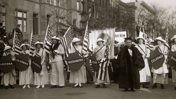 Dr. Anna Howard Shaw leading a suffrage parade in 1910s New York City