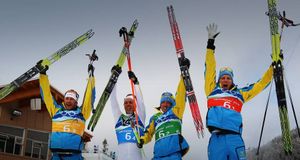 (L-R) Anders Soedergren, Marcus Hellner, Johan Olsson and Daniel Richardsson of Sweden celebrate winning the gold medal during the Men’s Cross Country 4 x 10 km relay at the 2010 Vancouver Winter Olympics on February 24, 2010 --Lars Baron/Bongarts/Getty I &copy; (Bing Canada)
