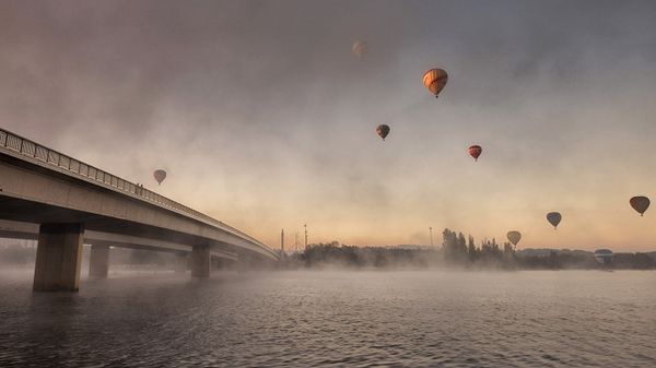 Hot air balloons seen from Lake Burley Griffin, Canberra, Australian Capital Territory
