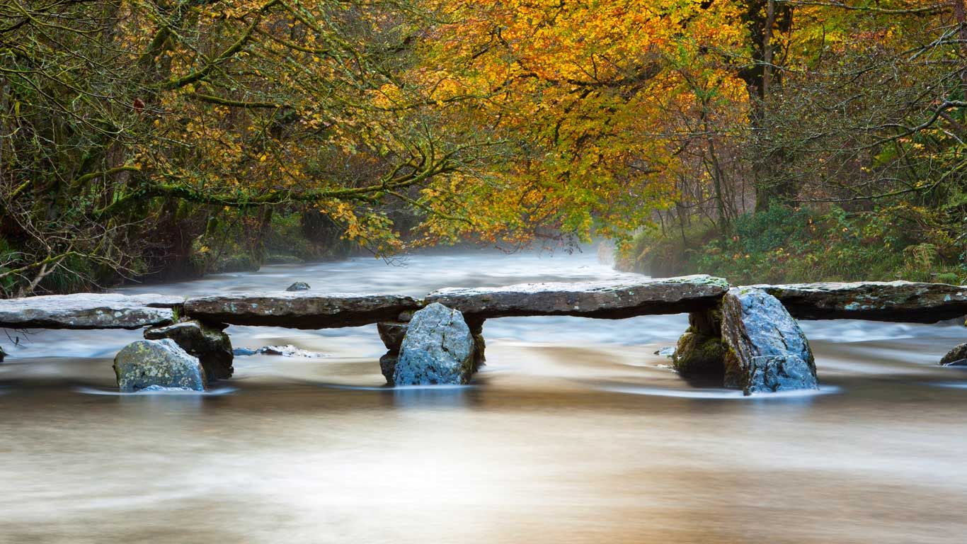 The Tarr Steps across the River Barle in Exmoor National Park, Somerset, England