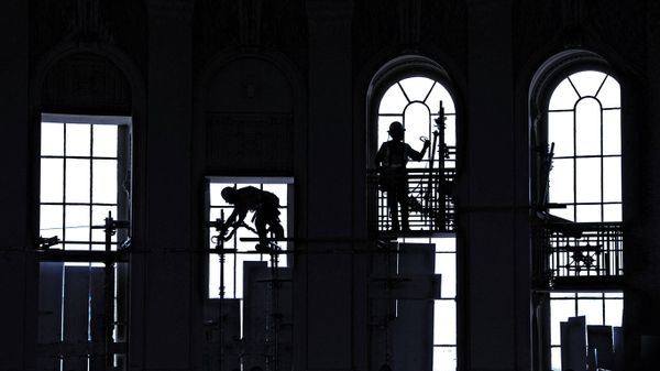 Workers restoring the rotunda of the US Capitol in Washington, DC