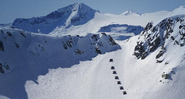 Snow cats grooming the snow on Whistler Mountain, British Columbia