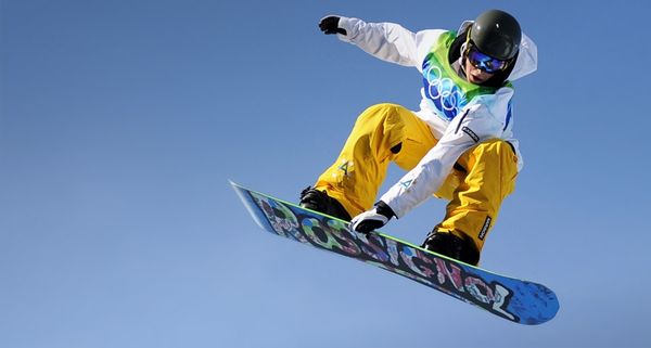 Torah Bright of Australia gets airborne during a training session of the Women's Snowboard Halfpipe event at the Vancouver Winter Olympics on February 18, 2010
