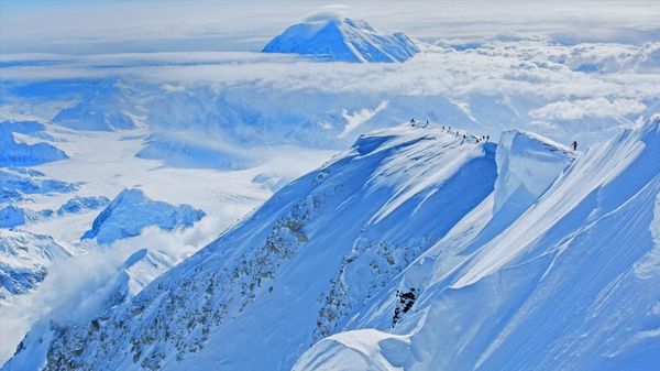 Climbers ascend Mount McKinley in Denali National Park and Preserve, Alaska, USA