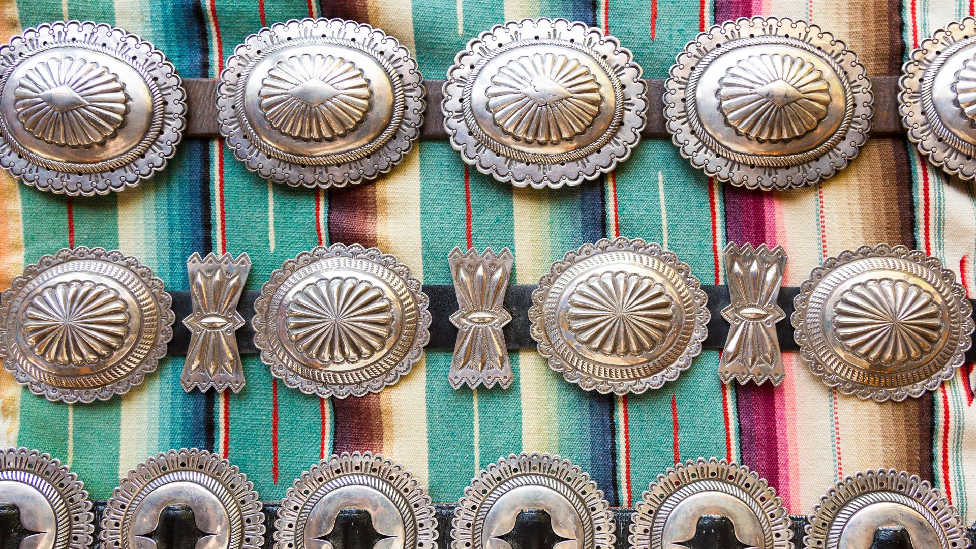 Collection of silver Native American concho belts, Santa Fe, New Mexico