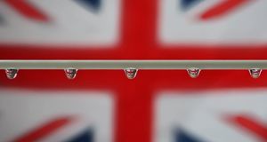 Raindrops reflected against a Union Jack flag (© Care Johnson) &copy; (Bing United Kingdom)