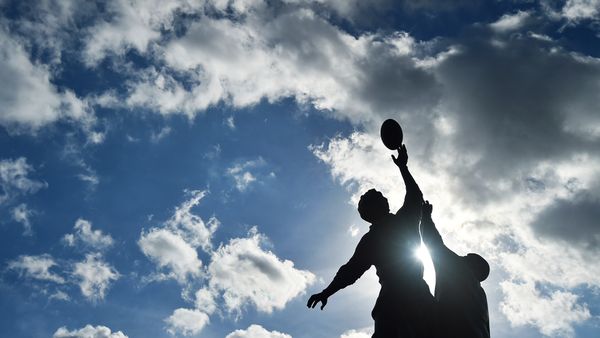 Bronze statue of a rugby line-out by British sculptor Gerald Laing outside Twickenham Stadium, south-west London