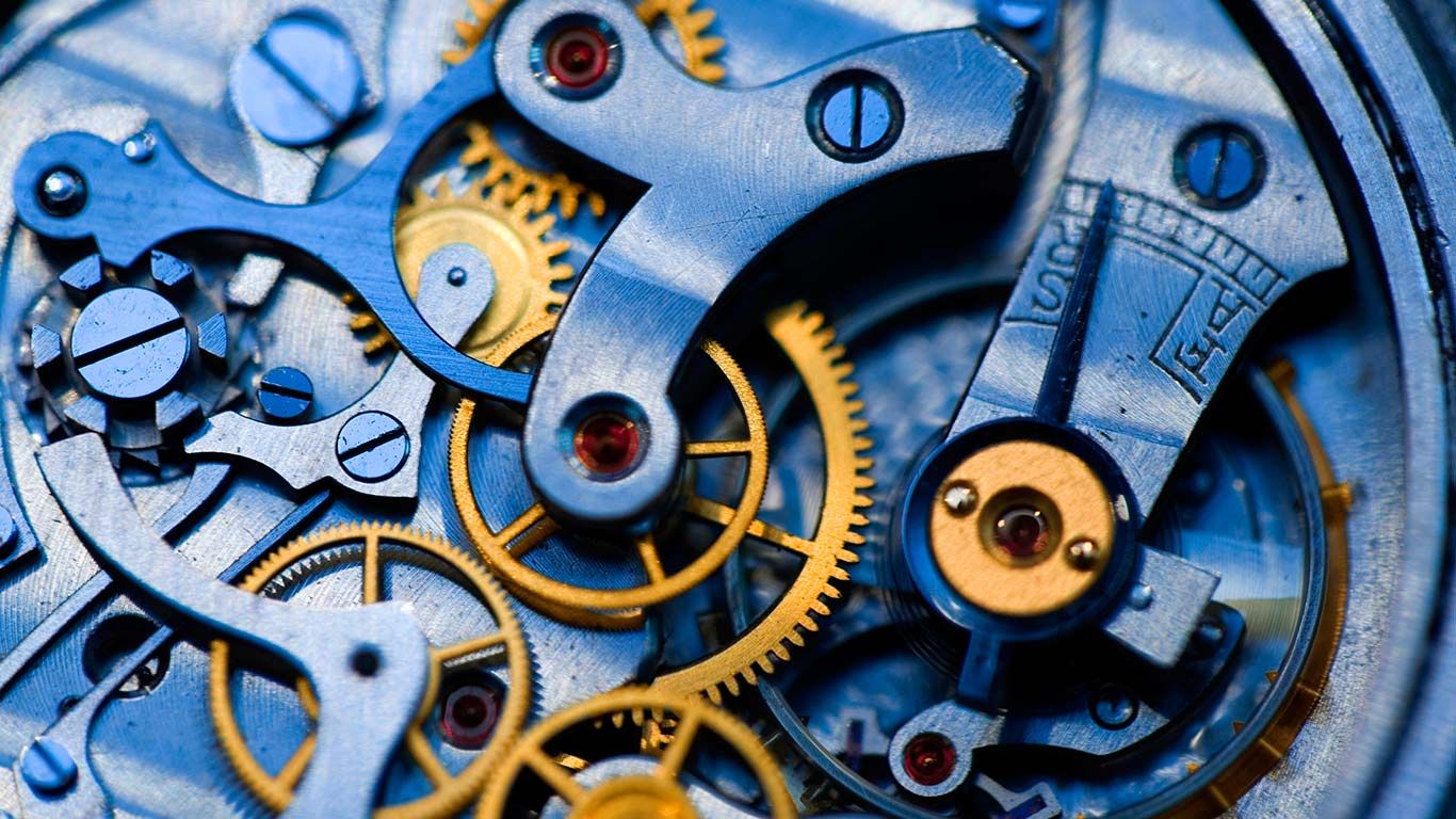 Gears and rubies inside an antique watch