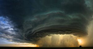 A supercell thunderstorm rolls across the Montana prairie at sunset -- Sean Heavey &copy; (Bing United States)