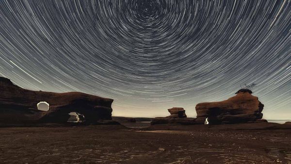 A Martian-esque landscape of sandstone arches in Nova Scotia's Minas Basin at low tide