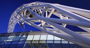 The steel arch of Wembley Stadium in the evening sun, London, England -- Michael Szönyi/Photolibrary &copy; (Bing United Kingdom)