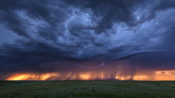 Lightning and storm clouds at sunset near Bowman, Nebraska, United States