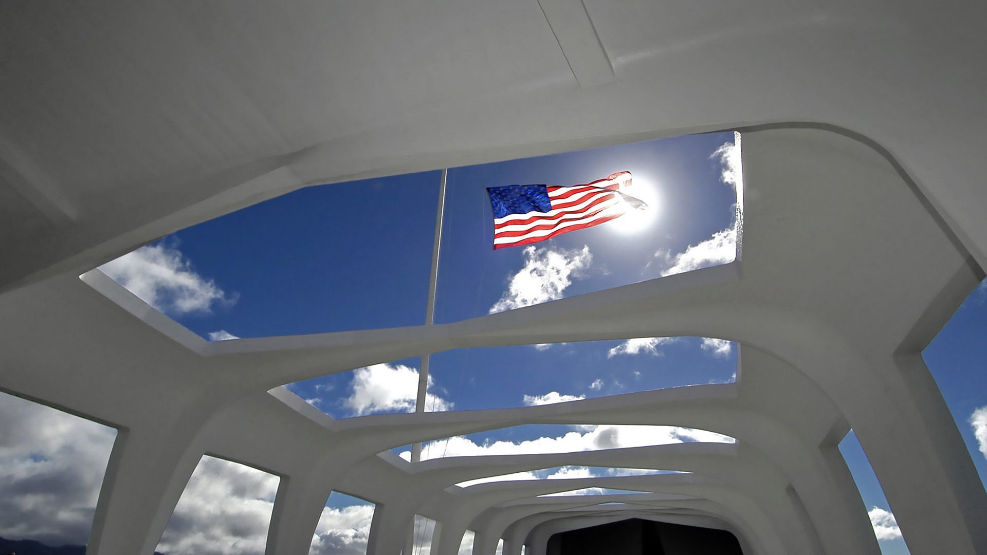 Flag above the USS Arizona Memorial in Honolulu, Hawaii