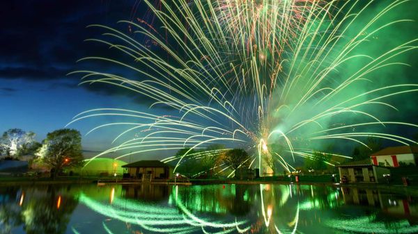 Wales Colwyn Bay Eirias Park fireworks display reflected in the lake