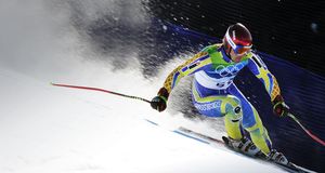 Tajikistan's Andrey Drygin, wearing an old Swedish team ski outfit, clears a gate during the Men's Super-G race at the Vancouver 2010 Winter Olympics on 19 February 2010 – Fabrice Coffrini/AFP/Getty Images &copy; (Bing United Kingdom)