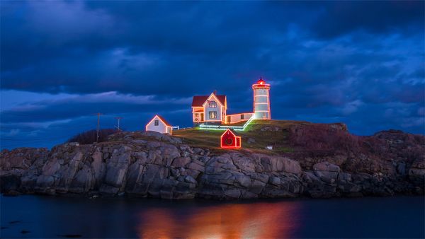 Christmas lights on Cape Neddick Light in York, Maine, USA