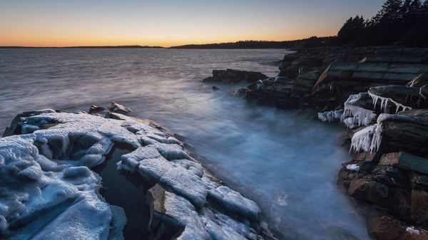 Thick ice clings to the Atlantic coast of Nova Scotia, Canada