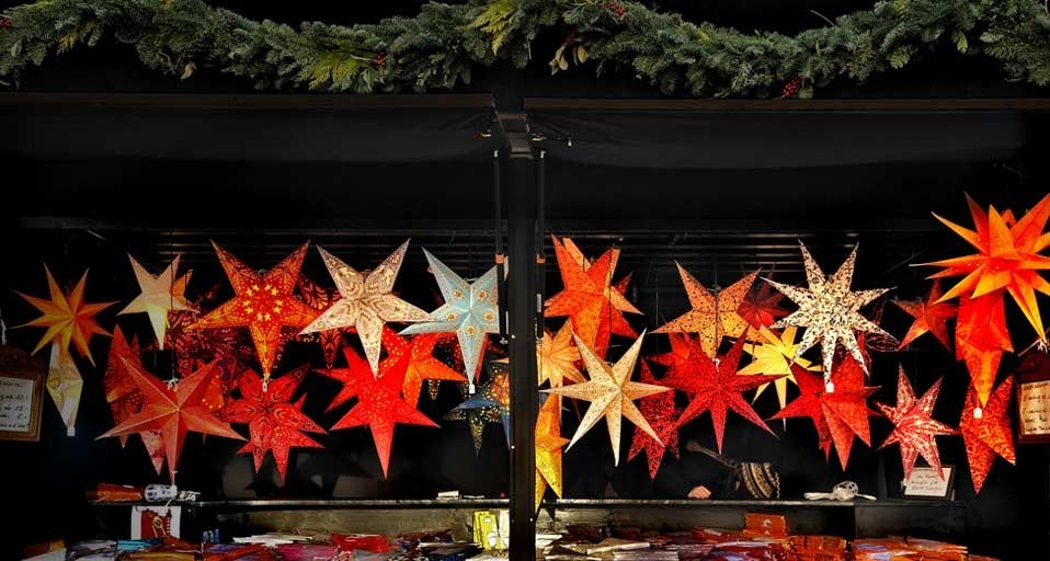 Luminous star decorations at the Christmas Market at the Town Hall in Munich, Germany