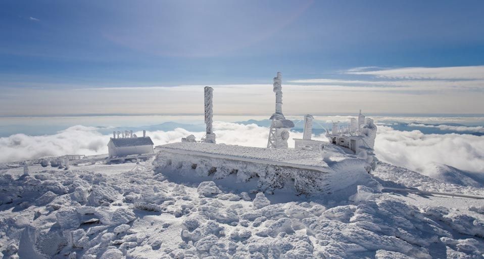 The Mount Washington Observatory, completely covered in hard rime ice, on the summit of Mount Washington, New Hampshire