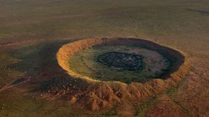 Meteorite impact crater near Halls Creek, Western Australia (© Randy Olson/National Geographic Creative/Getty Images)(Bing New Zealand)