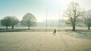 Man running in front of rugby post (© Michael Blann/Getty Images)(Bing United Kingdom)