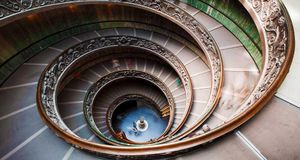 Visitors descending the spiral stairs of the Vatican Museums, Vatican City (© Getty Images)(Bing United States)