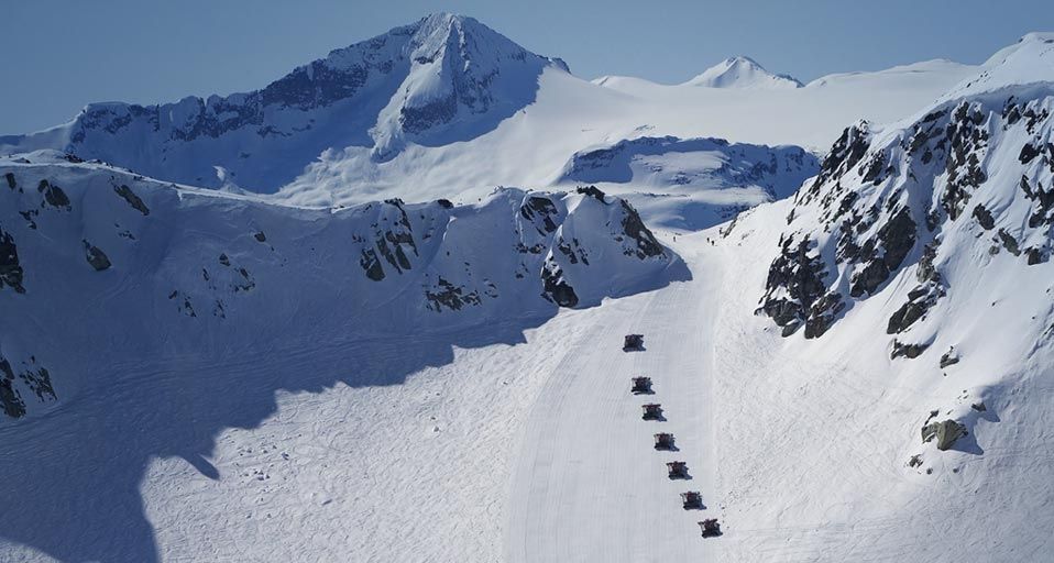 Snow cats grooming the snow on Whistler Mountain, British Columbia
