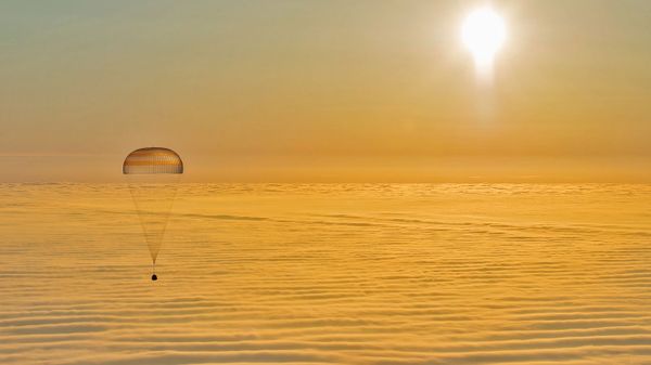 A Soyuz descent module returns to Earth