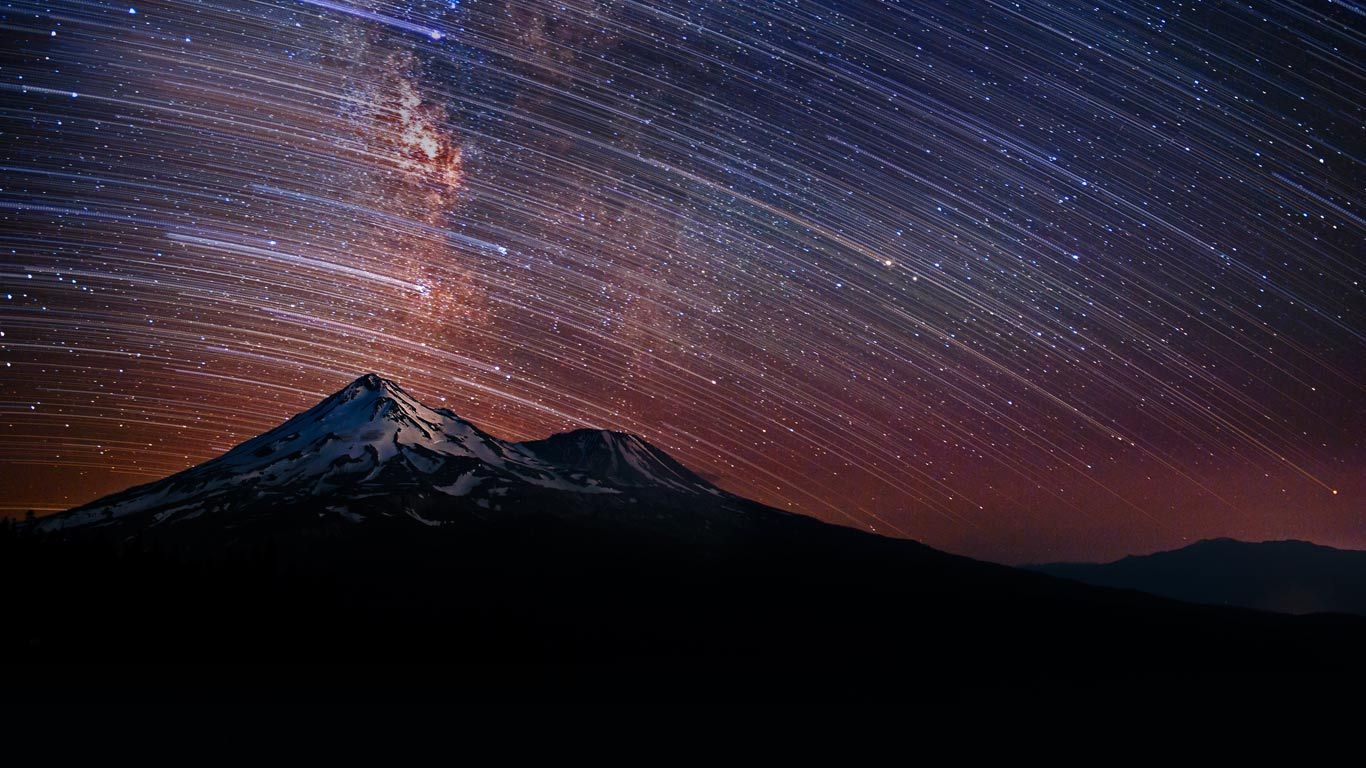 Star trails over Mount Shasta in California