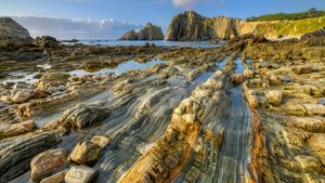 Quartzite formation, Playa del Silencio, Asturias, Spain (© Jean-Philippe Delobelle/Minden Pictures)(Bing United States)