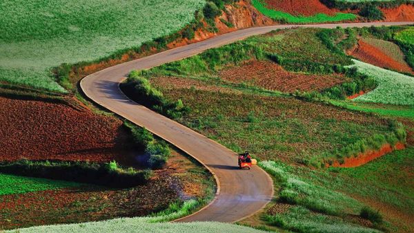 Rolling hills and red earth in Dongchuan, China