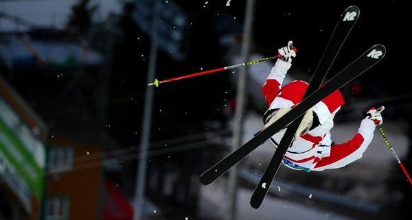 A skier performs during the Women's Moguls Freestyle Skiing qualification at the 2010 Vancouver Winter Olympics on February 13, 2010