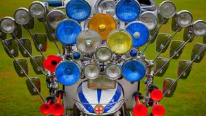 A scooter adorned with multiple mirrors, lights, and air horns (© stocknshares/Getty Images)(Bing United States)