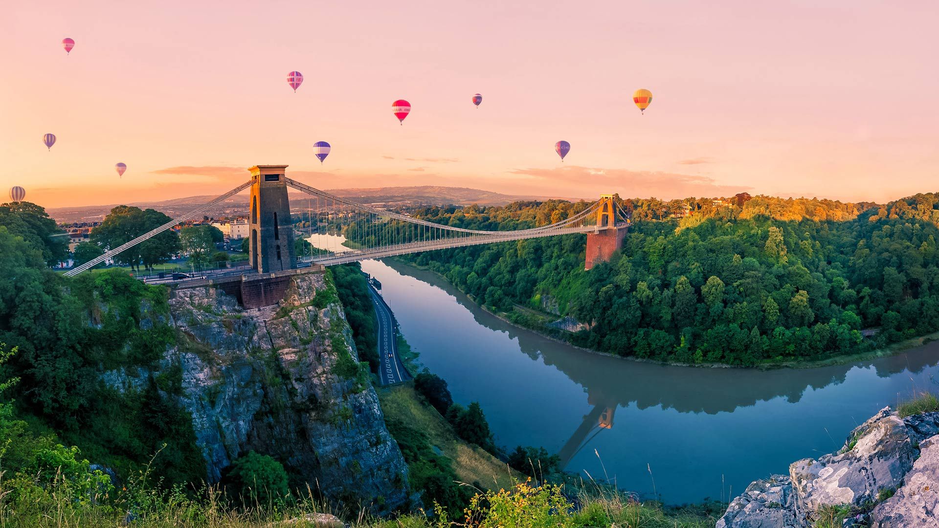 Hot air balloons over Clifton Suspension Bridge at sunrise, Bristol