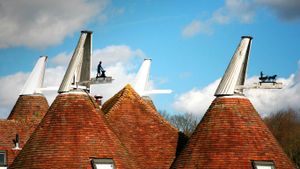 Oast house roofs with wind vanes decorated with agricultural scenes on a farm in Kent (© Steve Taylor ARPS/Alamy)(Bing United Kingdom)