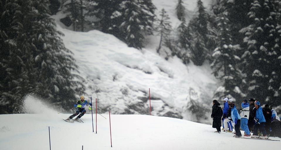 Sweden's Andre Myhrer skis under heavy snowfall during the Men's Slalom race at the Vancouver 2010 Winter Olympics on February 27, 2010
