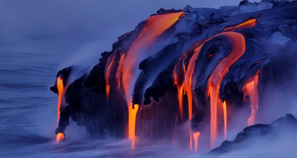 Viscous lava from Kilauea continues to pour into the ocean at Kalapana, Hawaii