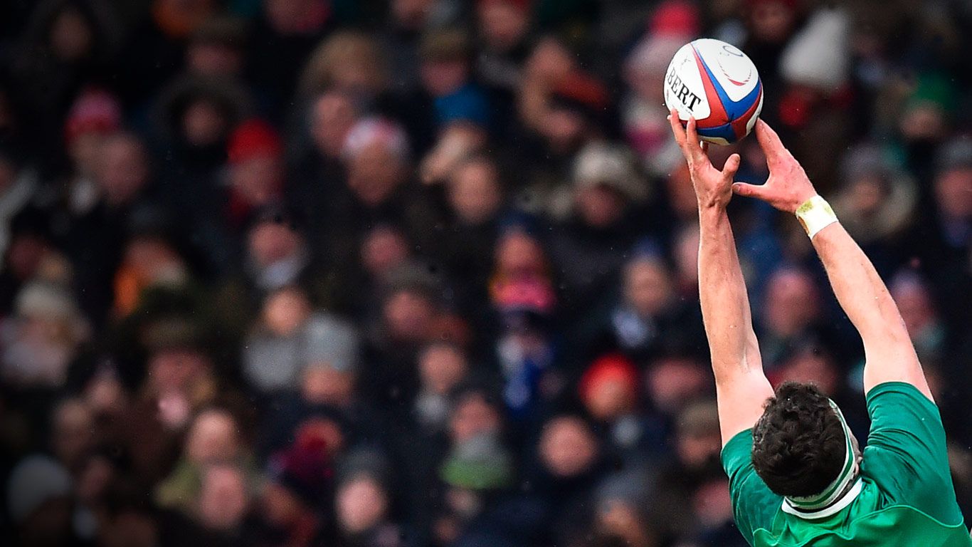 The ball is taken from a line-out during a Six Nations rugby match