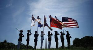 A U.S. military color guard  at the Vietnam Veterans Memorial in Washington, DC -- Chip Somodevilla/Getty Images &copy; (Bing United States)