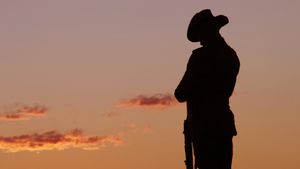 An ANZAC Soldier statue in the evening light (© t_rust/iStock/Getty Images Plus)(Bing Australia)
