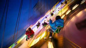A swing ride at a Christmas market in Berlin, Germany (© Hannibal Hanschke/Reuters)(Bing Australia)