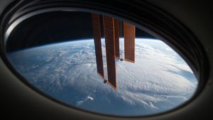 ISS main solar arrays seen from SpaceX Crew Dragon Endeavour (© NASA)(Bing Australia)