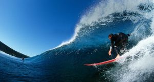 Side View of a Surfer Riding a Wave, Indijiup Beach, Western Australia (© Chris van Lennep/Getty Images) &copy; (Bing New Zealand)