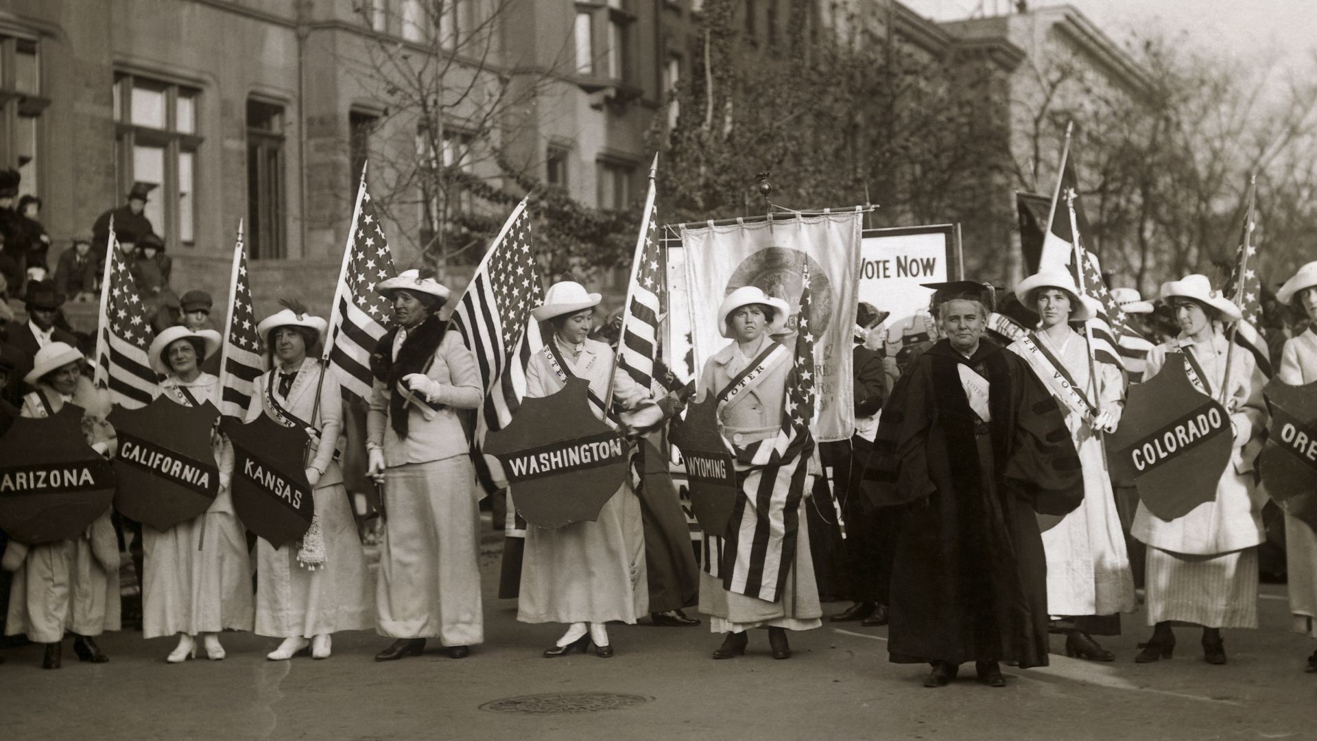 Dr. Anna Howard Shaw leading a suffrage parade in 1910s New York City