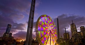 Colourful ferris wheel in Birrarung Marr park and the city skyline at dusk, Melbourne, Victoria, Australia  -- David Hannah/photolibrary &copy; (Bing New Zealand)
