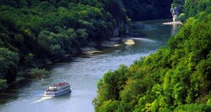 Boat in the Donaudurchbruch gorge on the Danube River near Kelheim, Germany -- Bildagentur Waldhaeusl/Age Fotostock &copy; (Bing New Zealand)